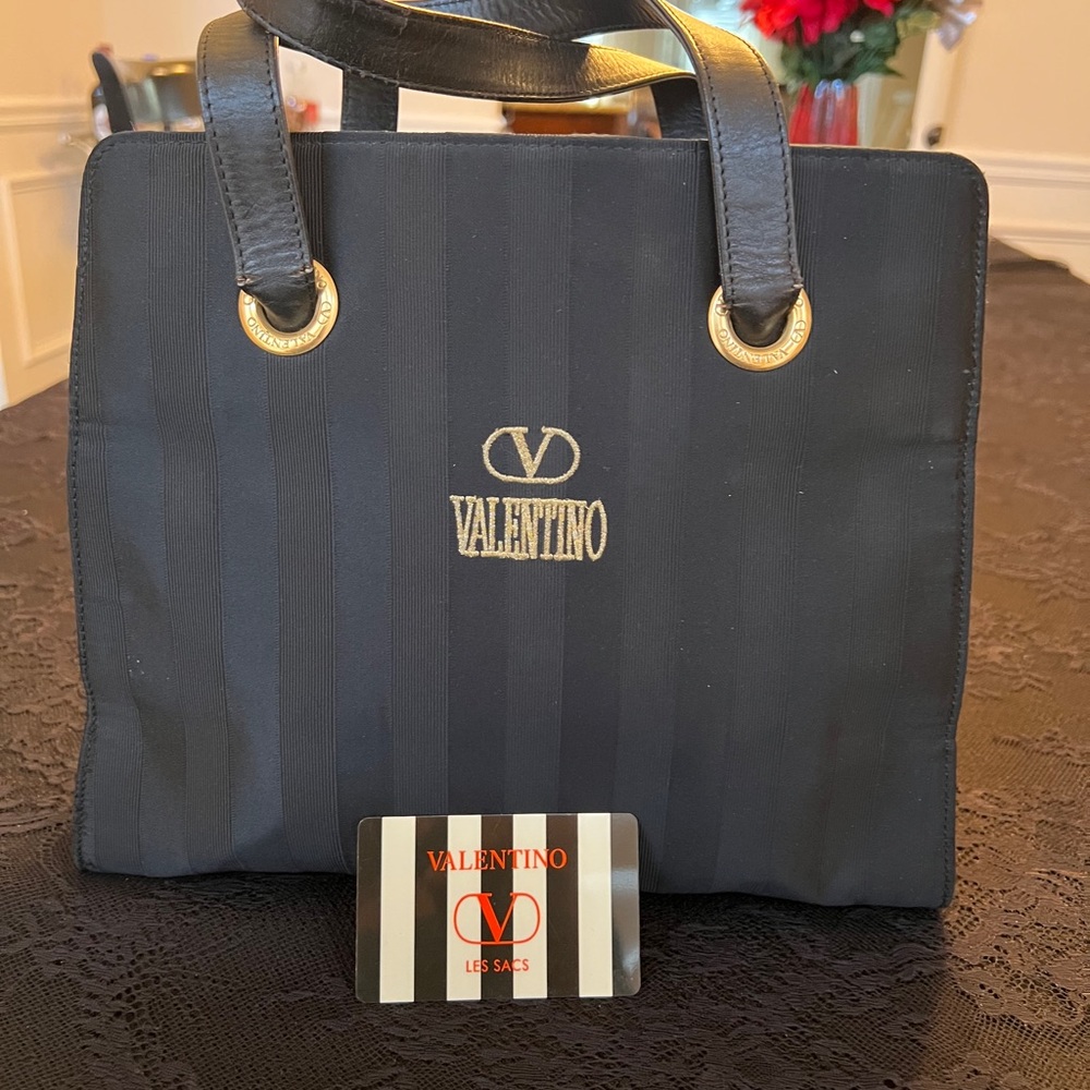Valentino Garavani Black Shoulder Bag with Gold Accents